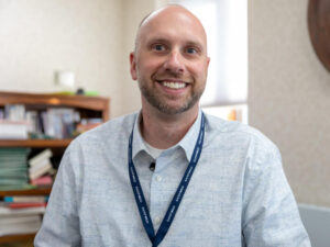 Smiling businessman in an office.