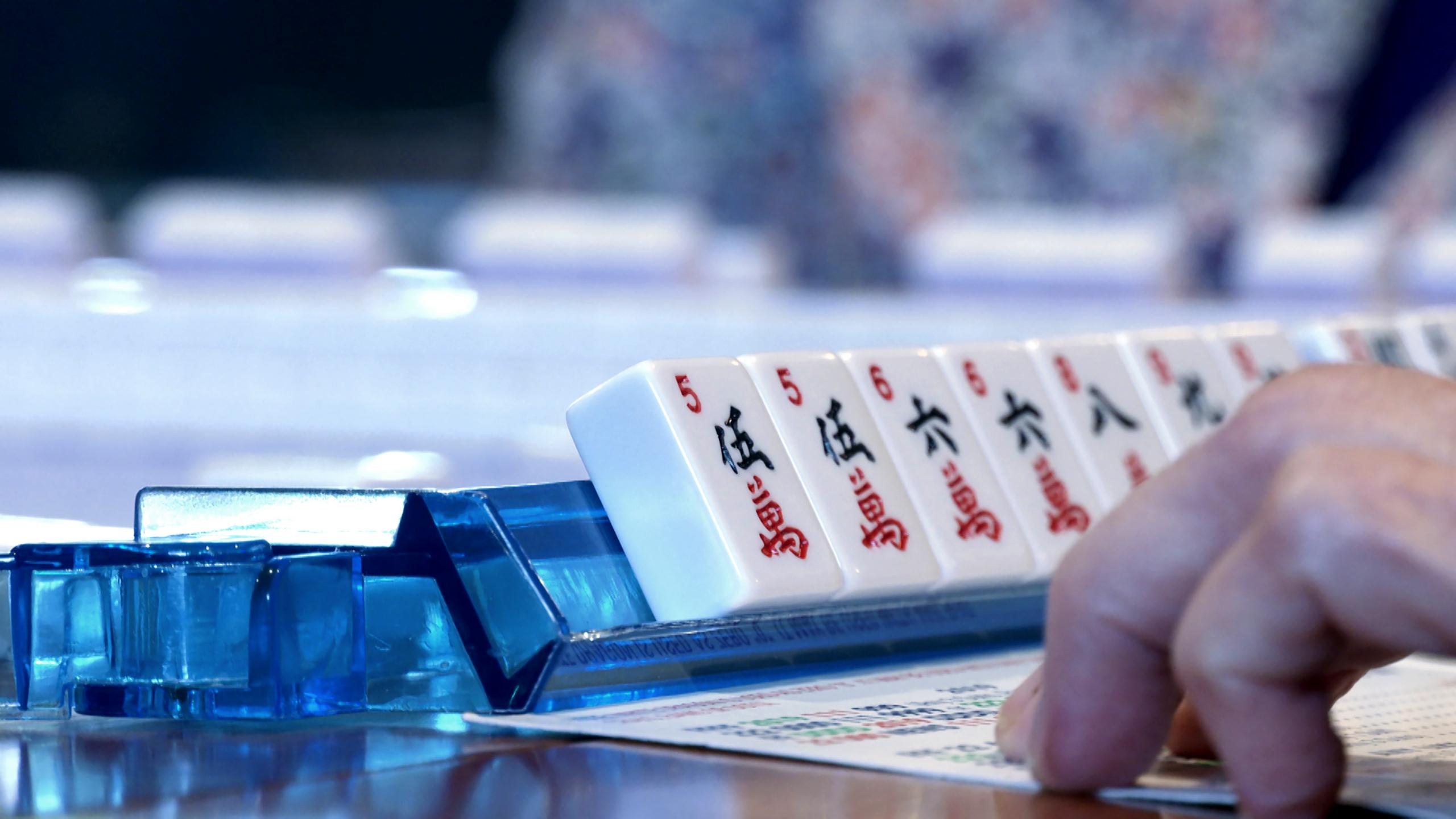 Closeup of a set of mahjong tiles.