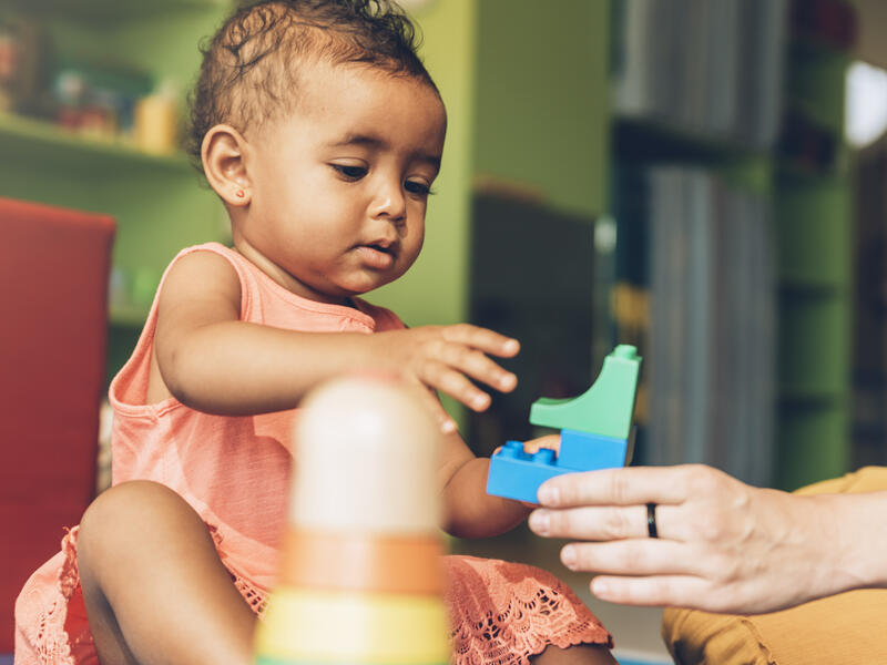 Baby hand and finger skills come with practice