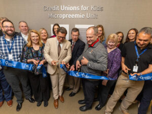 Donors and hospital staff cut the ribbon to open Sanford Fargo's new micropreemie unit.