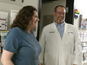 heart implantable defibrillator device patient smiles with doctor