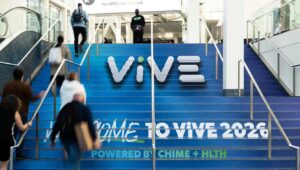 Screenshot of people climbing staircase with "ViVE 2026 powered by CHIME + HLTH" printed on it.