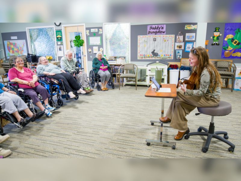 Activities assistant wows residents with music