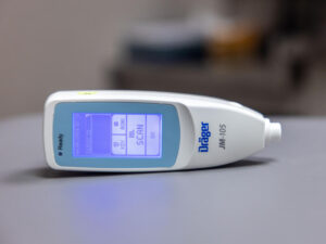 Bilimeter digital device on a clinical exam table.