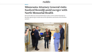 Minnesota Attorney General Keith Ellison speaks with Sanford Bemidji obstetrician-gynecologist Johnna Nynas about rural maternity care while on a tour with Sanford Health executives.