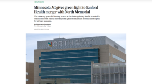 Screenshot from Minnesota Star Tribune with photo of hospital building under headline "Minnesota AG gives green light to Sanford Health merger with North Memorial"